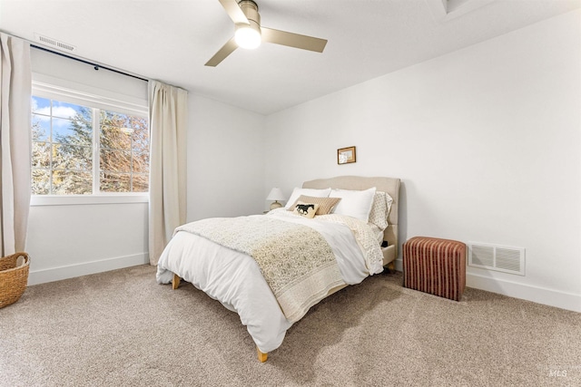 bedroom with ceiling fan and carpet flooring