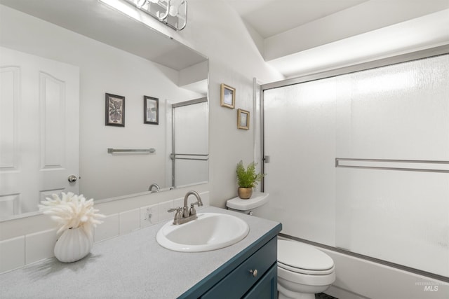 398 N Pebble Beach Way, Eagle, ID 83616 - bathroom with toilet, vanity, and combined bath / shower with glass door