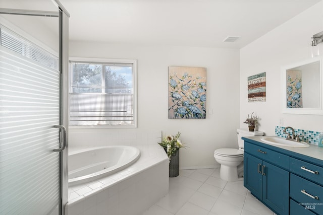 398 N Pebble Beach Way, Eagle, ID 83616 - full bath featuring vanity, a garden tub, tile patterned floors, baseboards, and toilet