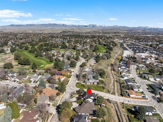 398 N Pebble Beach Way, Eagle, ID 83616 - aerial overview of property's location featuring nearby suburban area and a mountain backdrop