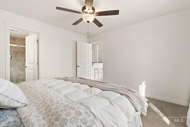 carpeted bedroom with visible vents, baseboards, and a ceiling fan