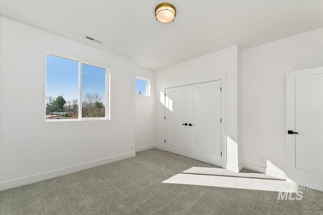 view of carpeted spare room