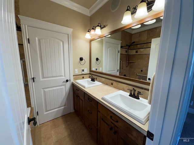 full bath with ornamental molding, double vanity, a sink, and walk in shower