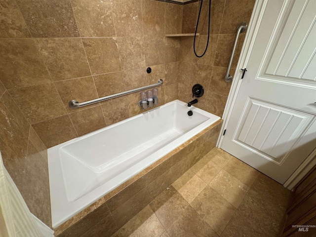 full bath with tiled shower / bath