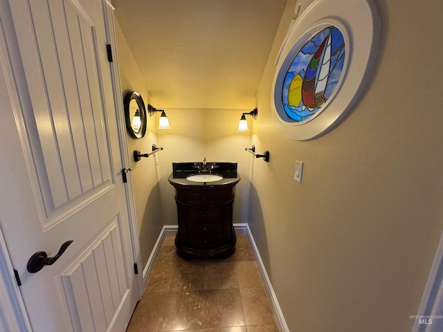 bathroom with baseboards