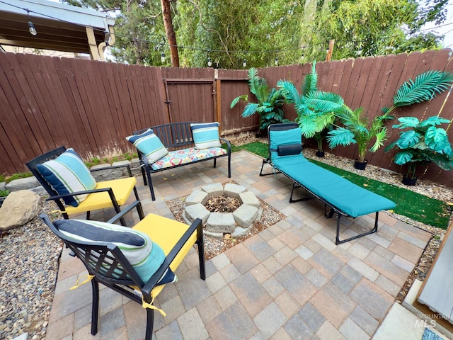 1639 E Boise Ave, Boise, ID 83706 - fenced backyard with a patio, a gate, and a fire pit
