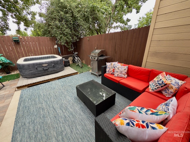 1639 E Boise Ave, Boise, ID 83706 - fenced backyard featuring an outdoor hangout area, grilling area, and a wooden deck