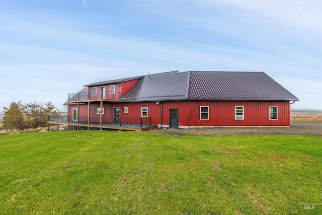 rear view of house with a lawn