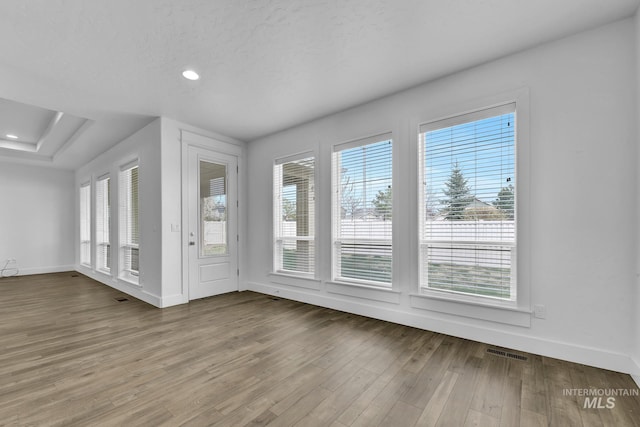 1734 Shoal Point Ave, Middleton, ID 83644 - interior space featuring a healthy amount of sunlight, wood finished floors, and baseboards