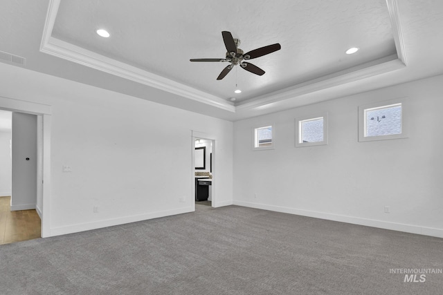 1734 Shoal Point Ave, Middleton, ID 83644 - spare room with ceiling fan, visible vents, carpet floors, a raised ceiling, and baseboards