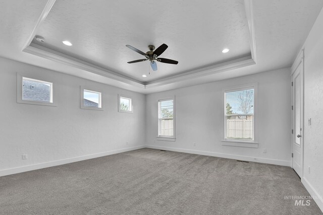 1734 Shoal Point Ave, Middleton, ID 83644 - carpeted empty room with baseboards, recessed lighting, a textured ceiling, a ceiling fan, and a tray ceiling