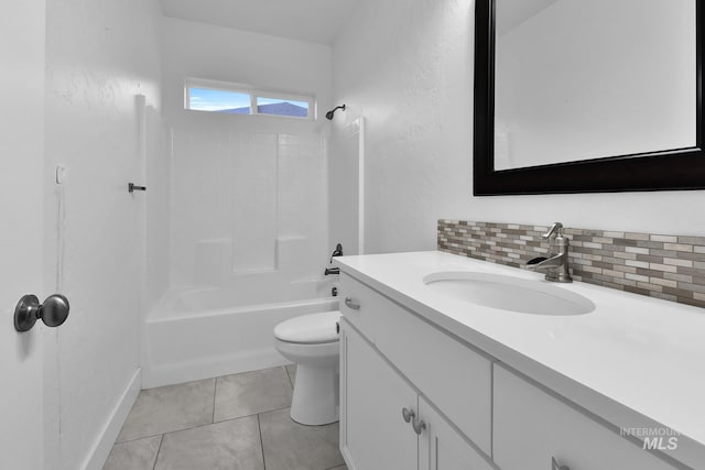 1734 Shoal Point Ave, Middleton, ID 83644 - full bathroom featuring tasteful backsplash, vanity, tile patterned floors, shower / bath combination, and toilet