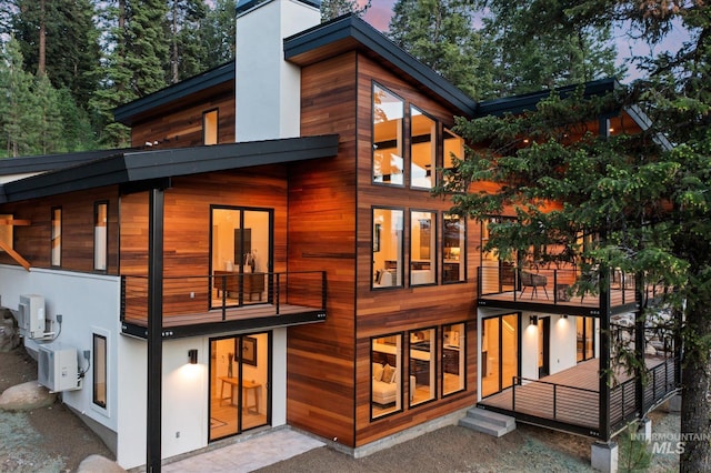 1678 Majestic View Dr, Mccall, ID 83638 - back of house featuring a balcony and a chimney