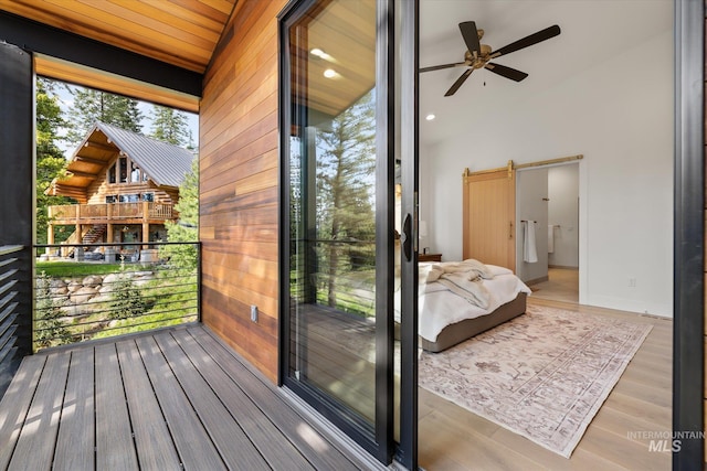 1678 Majestic View Dr, Mccall, ID 83638 - entryway featuring a ceiling fan, lofted ceiling, wood finished floors, and a barn door