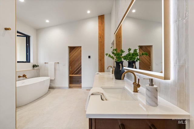1678 Majestic View Dr, Mccall, ID 83638 - full bathroom featuring double vanity, a soaking tub, and recessed lighting