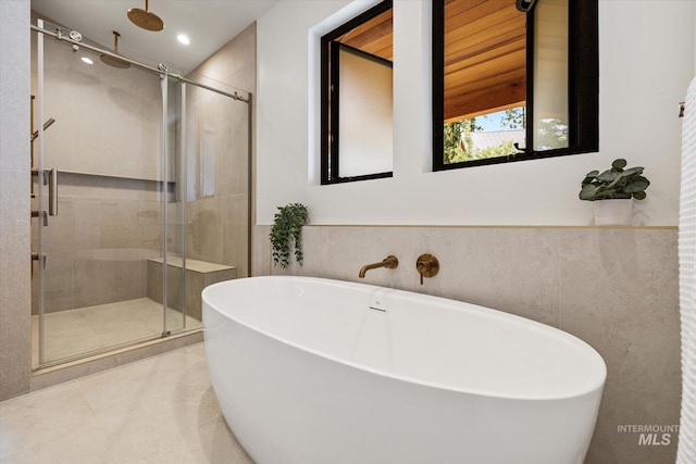 1678 Majestic View Dr, Mccall, ID 83638 - full bathroom with a stall shower, a freestanding tub, recessed lighting, and tile patterned floors
