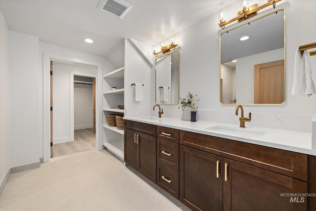 1678 Majestic View Dr, Mccall, ID 83638 - bathroom with double vanity, recessed lighting, and a spacious closet