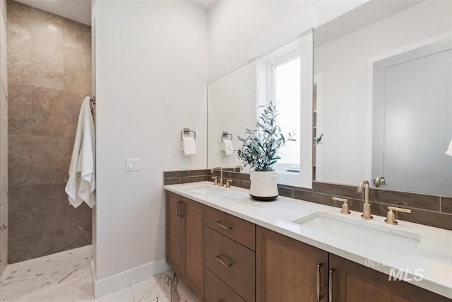 6874 N Fireball, Meridian, ID 83646 - bathroom with marble finish flooring, double vanity, a walk in shower, and baseboards