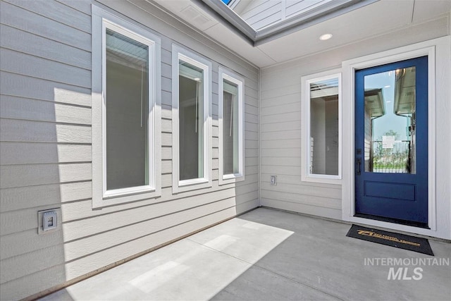 6874 N Fireball, Meridian, ID 83646 - doorway to property with a patio