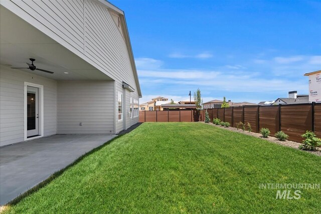 6874 N Fireball, Meridian, ID 83646 - view of yard with a ceiling fan and a patio