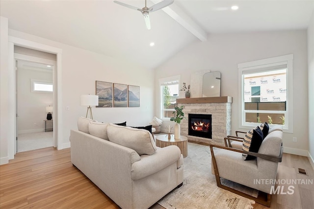 6874 N Fireball, Meridian, ID 83646 - living room with a fireplace, light wood-type flooring, recessed lighting, ceiling fan, and baseboards