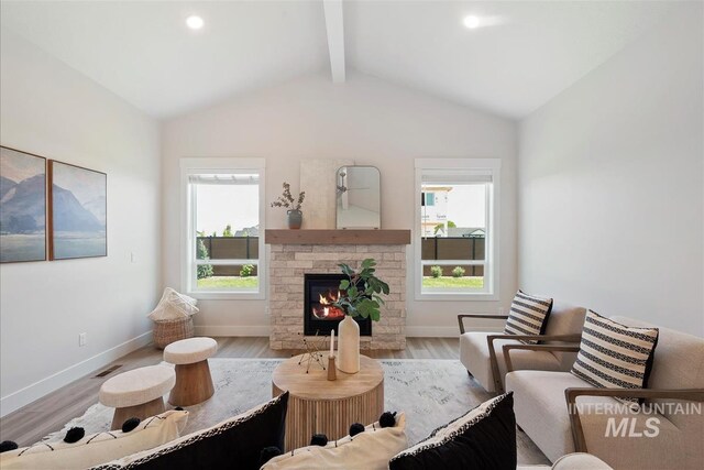 6874 N Fireball, Meridian, ID 83646 - living room featuring wood finished floors, a fireplace, baseboards, and recessed lighting
