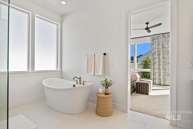 full bath featuring baseboards, a freestanding tub, ensuite bath, a ceiling fan, and recessed lighting