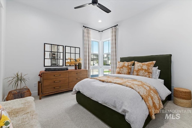 bedroom with light colored carpet, a ceiling fan, and recessed lighting