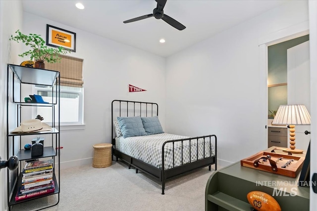 carpeted bedroom featuring baseboards, recessed lighting, and ceiling fan