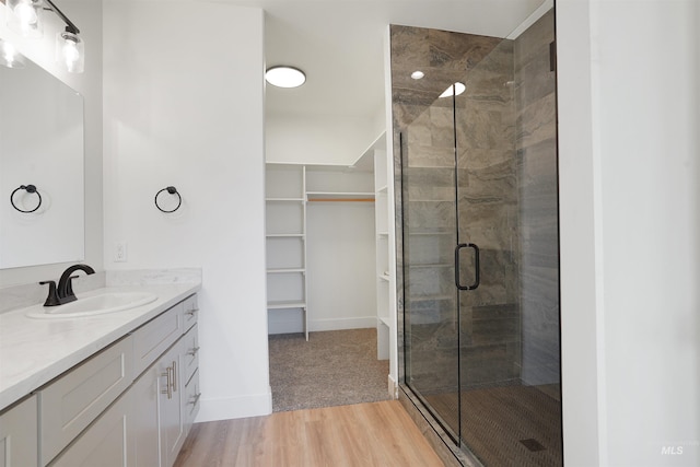 2950 Mcbride Pl, Burley, ID 83318 - bathroom with wood-type flooring, an enclosed shower, and vanity