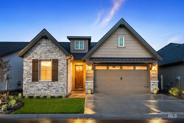 craftsman house with a garage