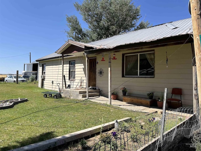 2131 N 2900 W, Arco, ID 83213 - view of front of home featuring metal roof and a front yard