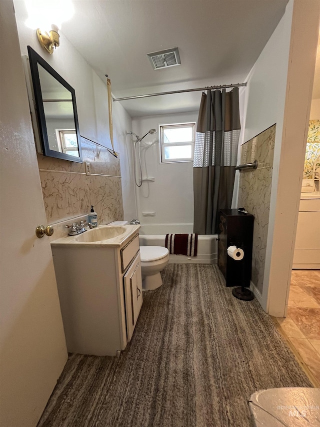 2131 N 2900 W, Arco, ID 83213 - full bath featuring toilet, vanity, visible vents, washer / clothes dryer, and shower / bath combo