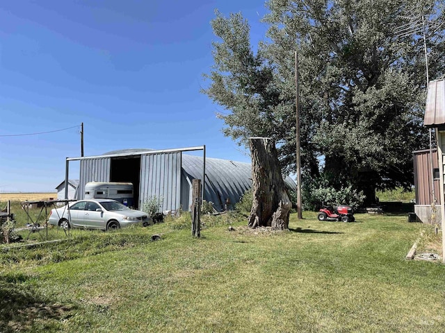 2131 N 2900 W, Arco, ID 83213 - view of yard with a pole building, a carport, and an outdoor structure