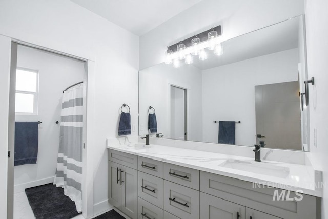 bathroom featuring vanity, tile patterned floors, and a shower with shower curtain