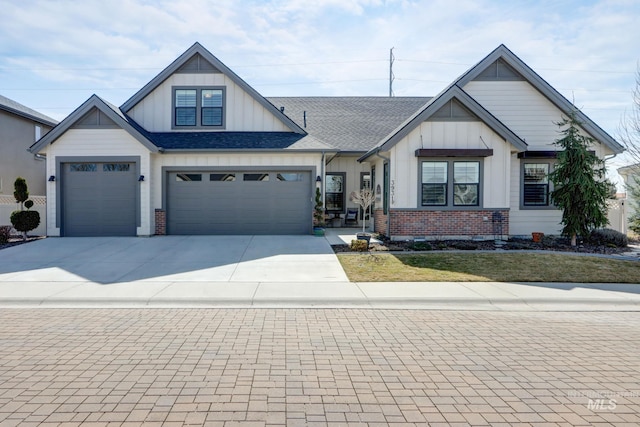 view of front facade with brick siding, board and batten siding, and concrete driveway