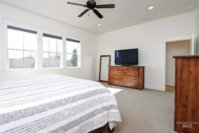 carpeted bedroom featuring recessed lighting, visible vents, baseboards, and ceiling fan