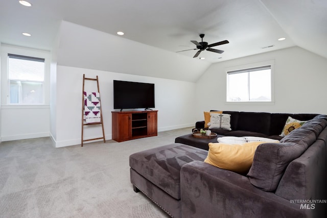 living area with lofted ceiling, recessed lighting, baseboards, and light carpet