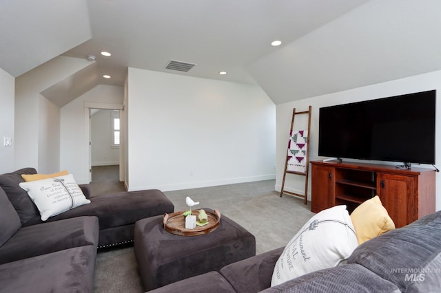 carpeted living room featuring visible vents, recessed lighting, baseboards, and lofted ceiling