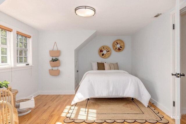 1919 N 21st St, Boise, ID 83702 - bedroom with light wood-type flooring and baseboards