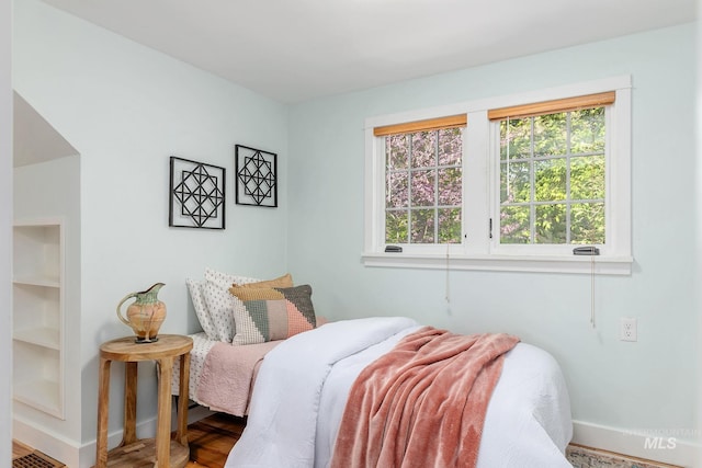 1919 N 21st St, Boise, ID 83702 - bedroom featuring baseboards and wood finished floors