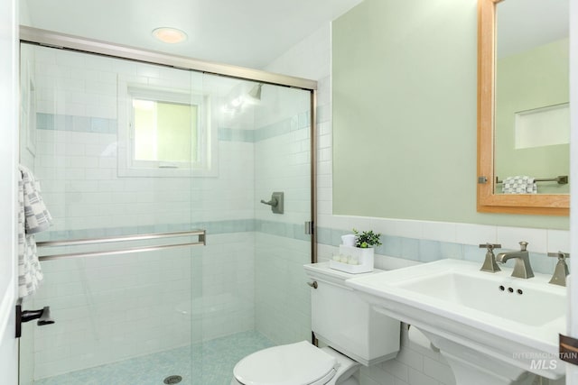 1919 N 21st St, Boise, ID 83702 - full bathroom featuring toilet, a shower stall, tile walls, and a sink
