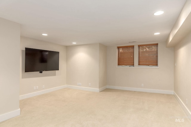 1919 N 21st St, Boise, ID 83702 - finished below grade area with recessed lighting, light colored carpet, and baseboards