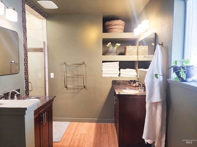 bathroom featuring vanity and hardwood / wood-style flooring