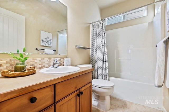 bathroom with vanity, shower / bath combo, tile patterned floors, toilet, and backsplash