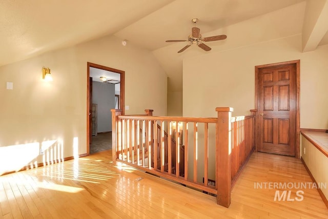 bonus room featuring ceiling fan, lofted ceiling, and light wood-type flooring