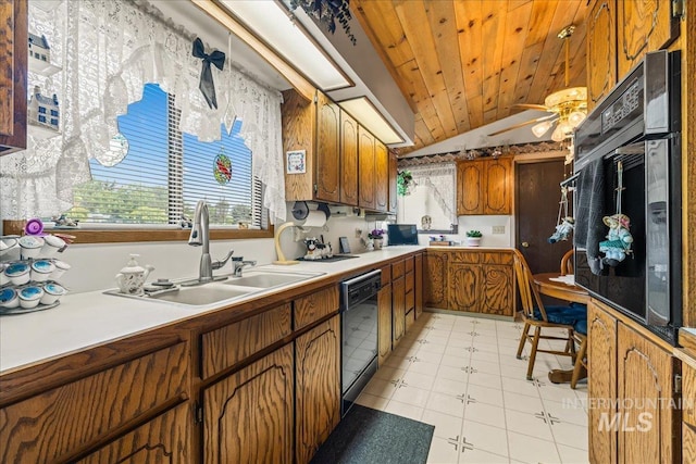 2503 Lyle Ct, Nampa, ID 83651 - kitchen with black appliances, brown cabinetry, lofted ceiling, a ceiling fan, and light countertops