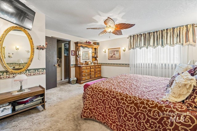2503 Lyle Ct, Nampa, ID 83651 - carpeted bedroom featuring a textured ceiling and ceiling fan