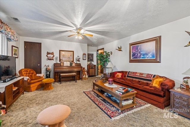 2503 Lyle Ct, Nampa, ID 83651 - living room with carpet, a textured ceiling, and a ceiling fan