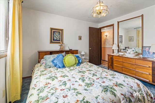 2503 Lyle Ct, Nampa, ID 83651 - bedroom with carpet flooring and a chandelier